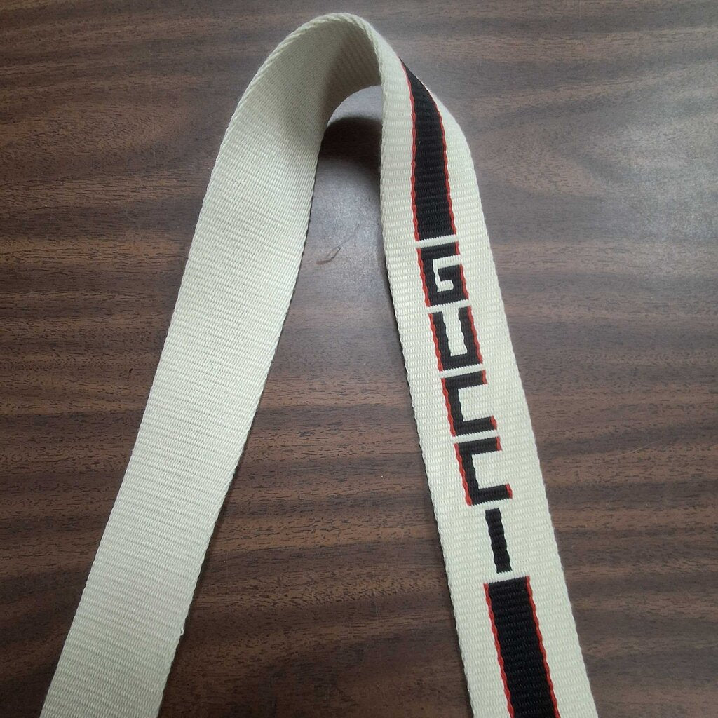 Gucci leather purse/enamel butterfly