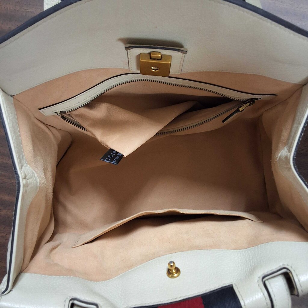 Gucci leather purse/enamel butterfly