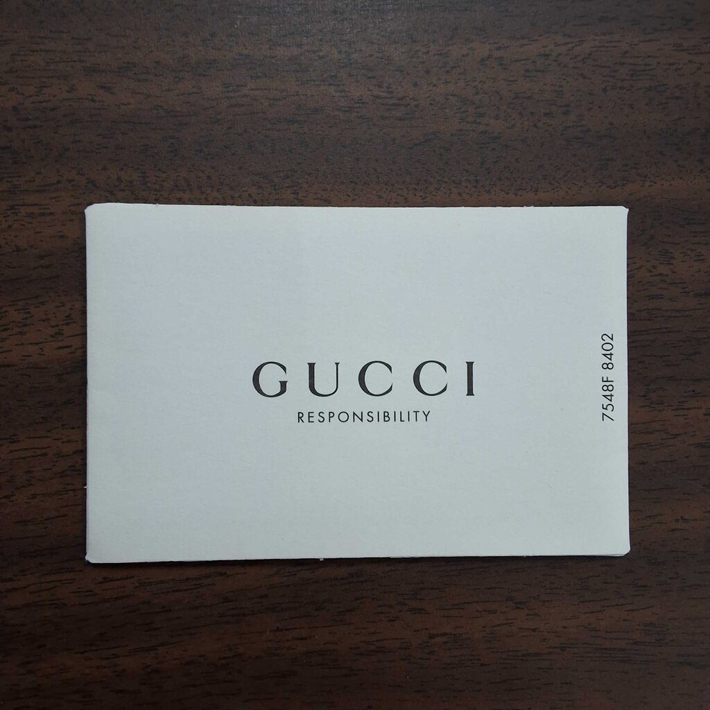 Gucci leather purse/enamel butterfly